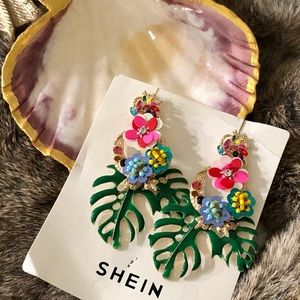 NWT floral and palm statement earrings